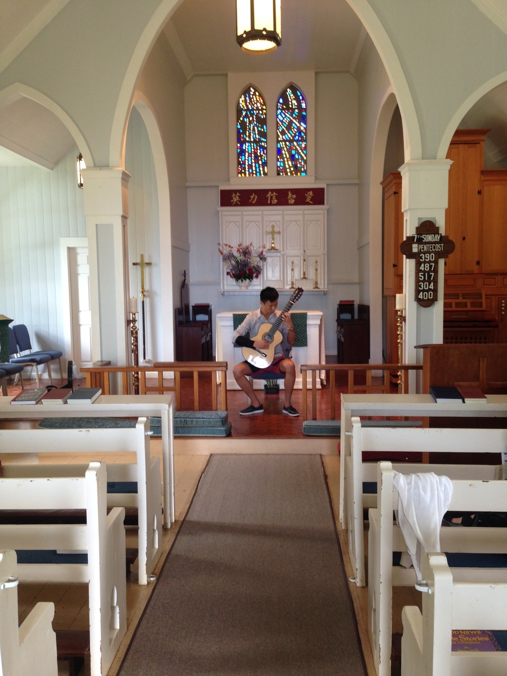 Ray Zhou warming up at St. John's Church, Kula (2014)
